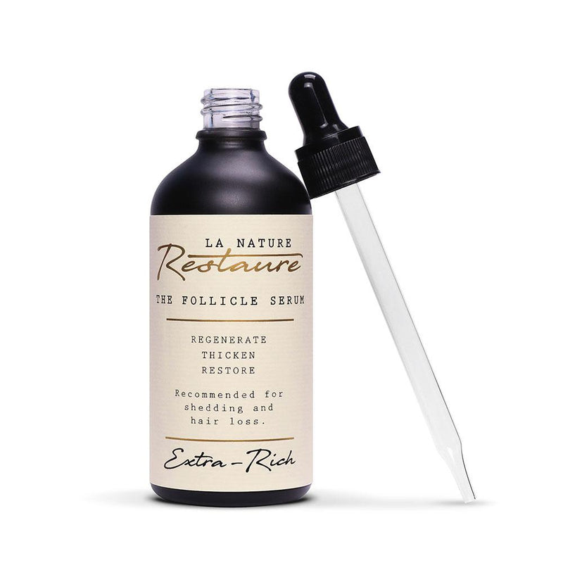 Open 100ml bottle of La Nature Restaure’s Follicle Serum Extra Rich Formula